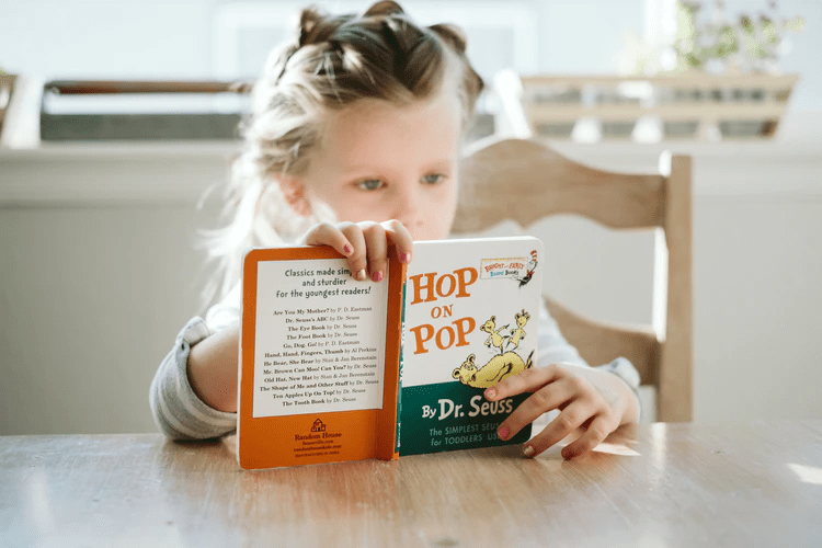 A Girl Holding Book